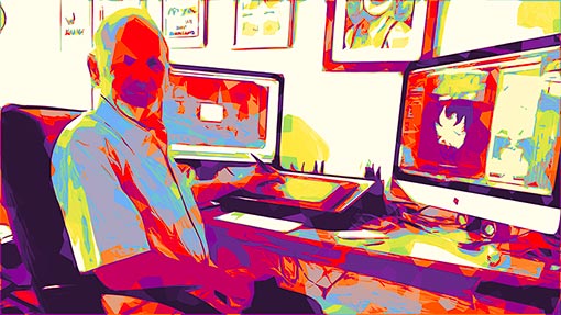 artist at desk, cartoonist sat at computer